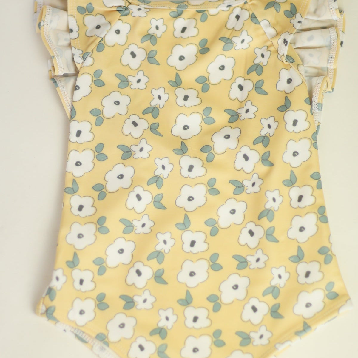 The Ruffle Back Bather (Yellow Flower)