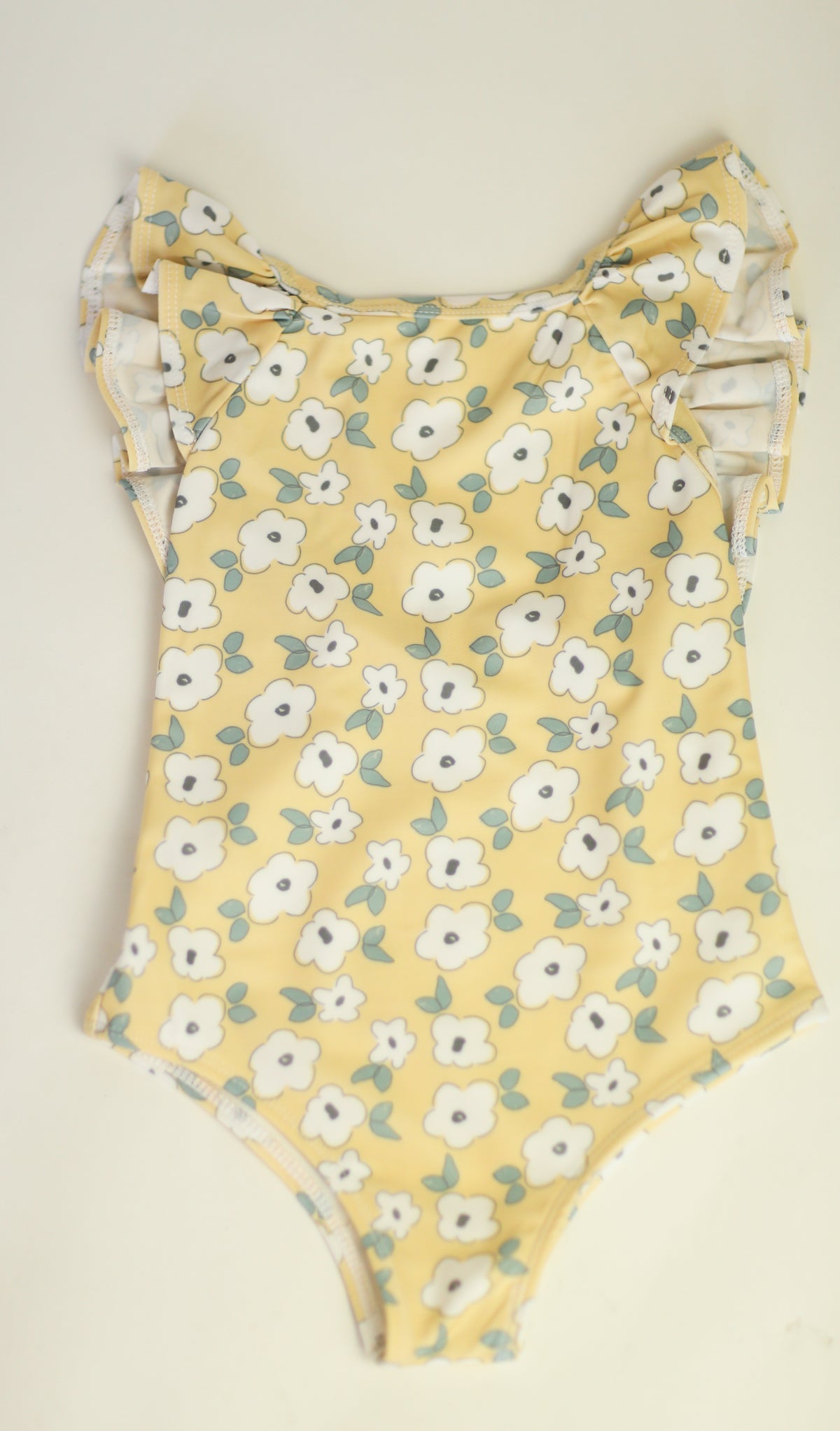 The Ruffle Back Bather (Yellow Flower)