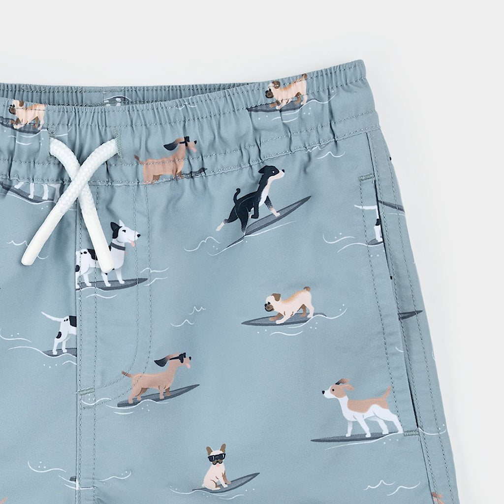 Surfing Pups Print on Blue Swim Trunks