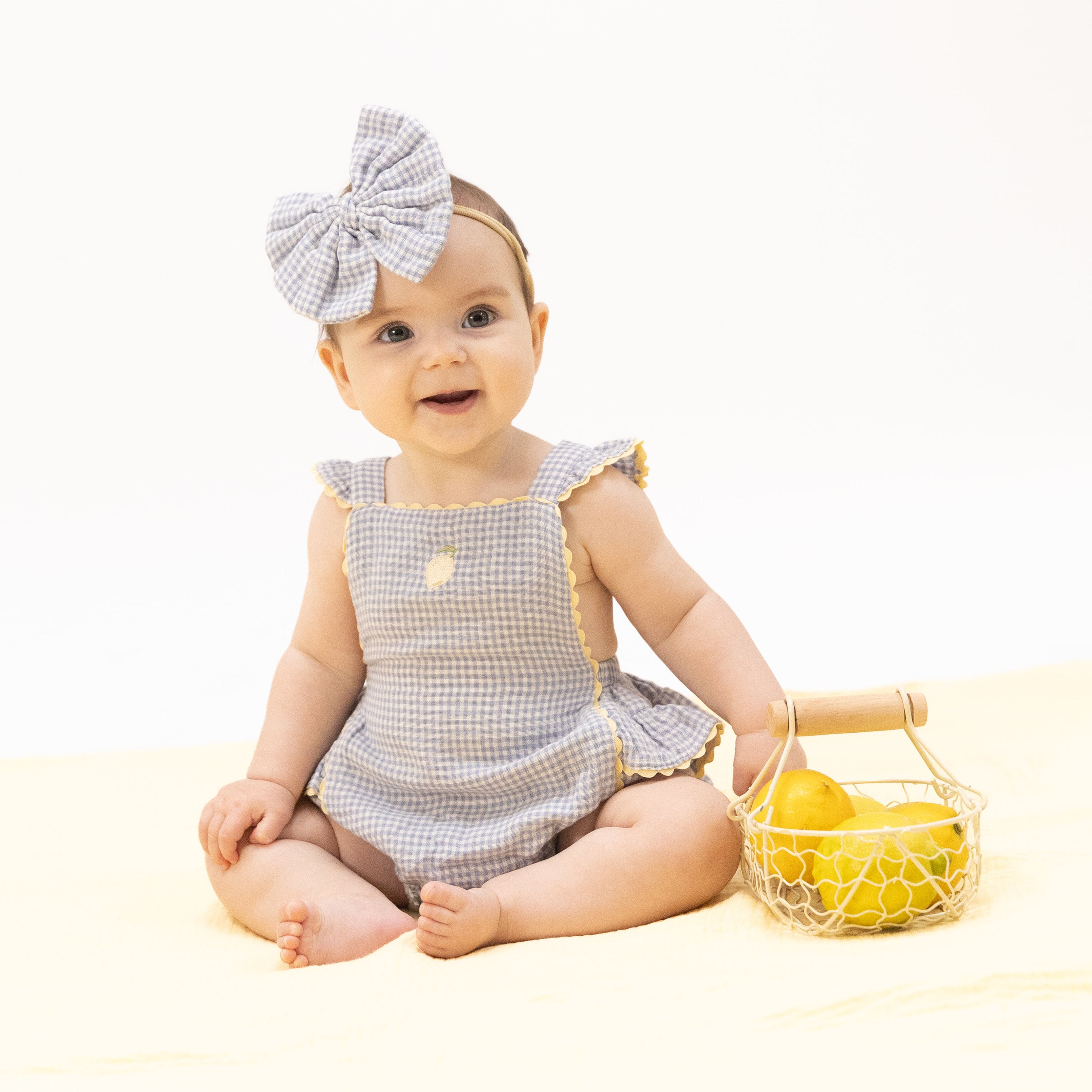 Ric Rac Ruffle Sunsuit (Micro Gingham Blue Blizzard)