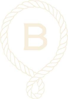 Cowboy lasso roped around the letter "B" which stands for Broomtail Kids, a mom-owned kid's boutique in Denver, Colorado.